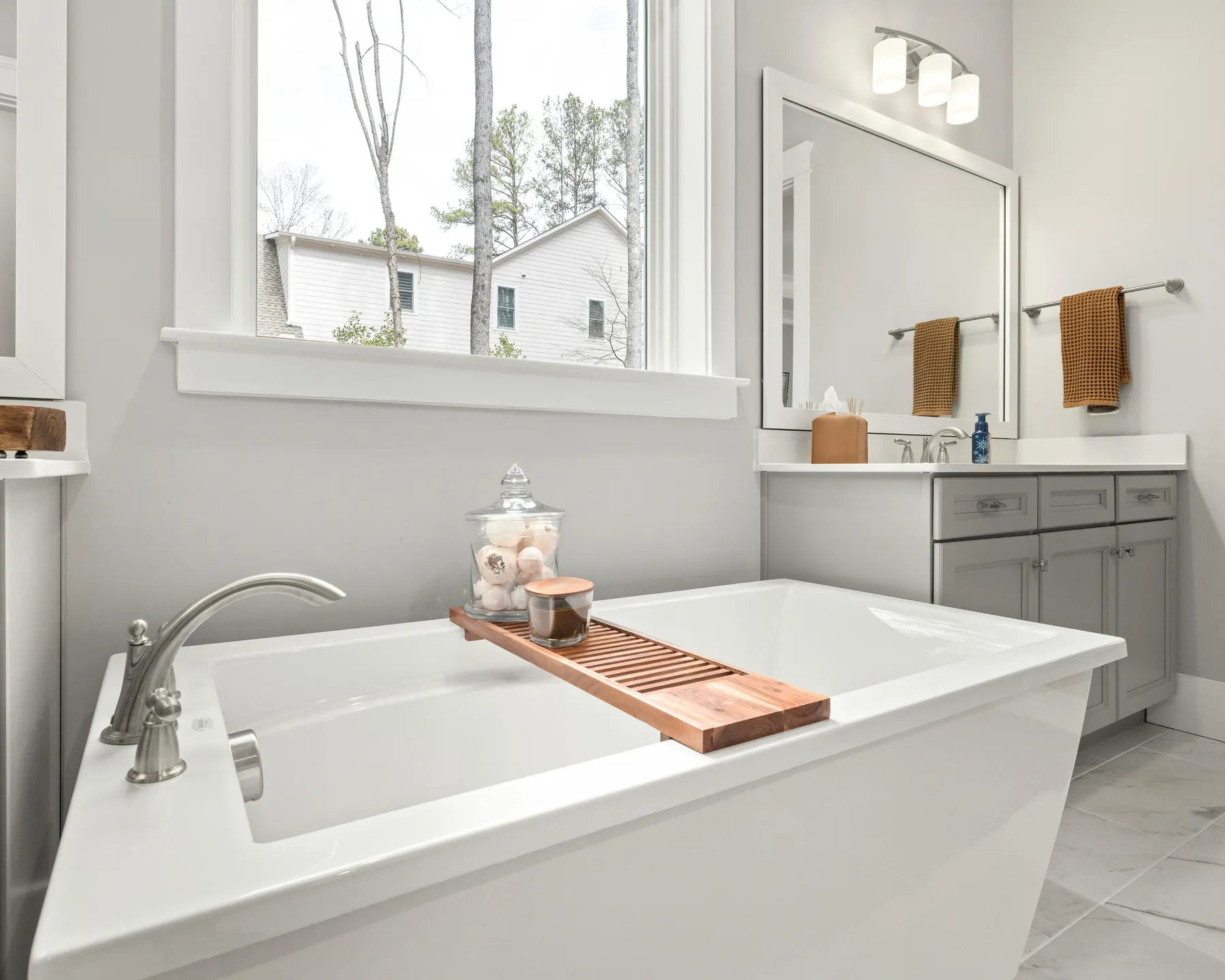 A bright bathroom used as a temporary contact page hero image.